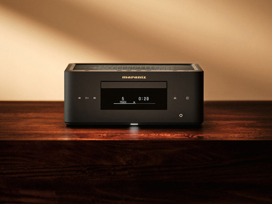 Marantz MCR 60n compact all in one hi fi system in black, shown front on in a living room setting